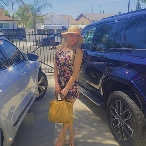 Floral Romper with Yellow And Pink Flowers Womens Size Small Like New